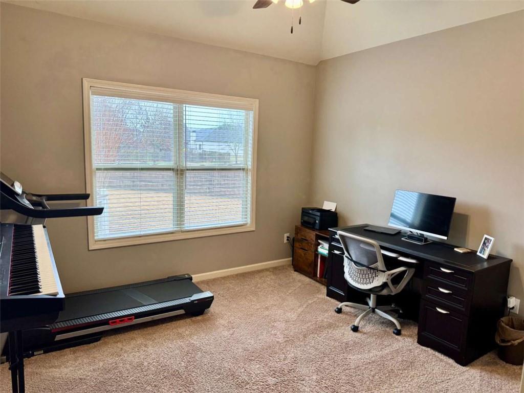 107 Feather Lane Jackson, GA 30233 - Photo 22 of 30 a view of a workspace with furniture and a window