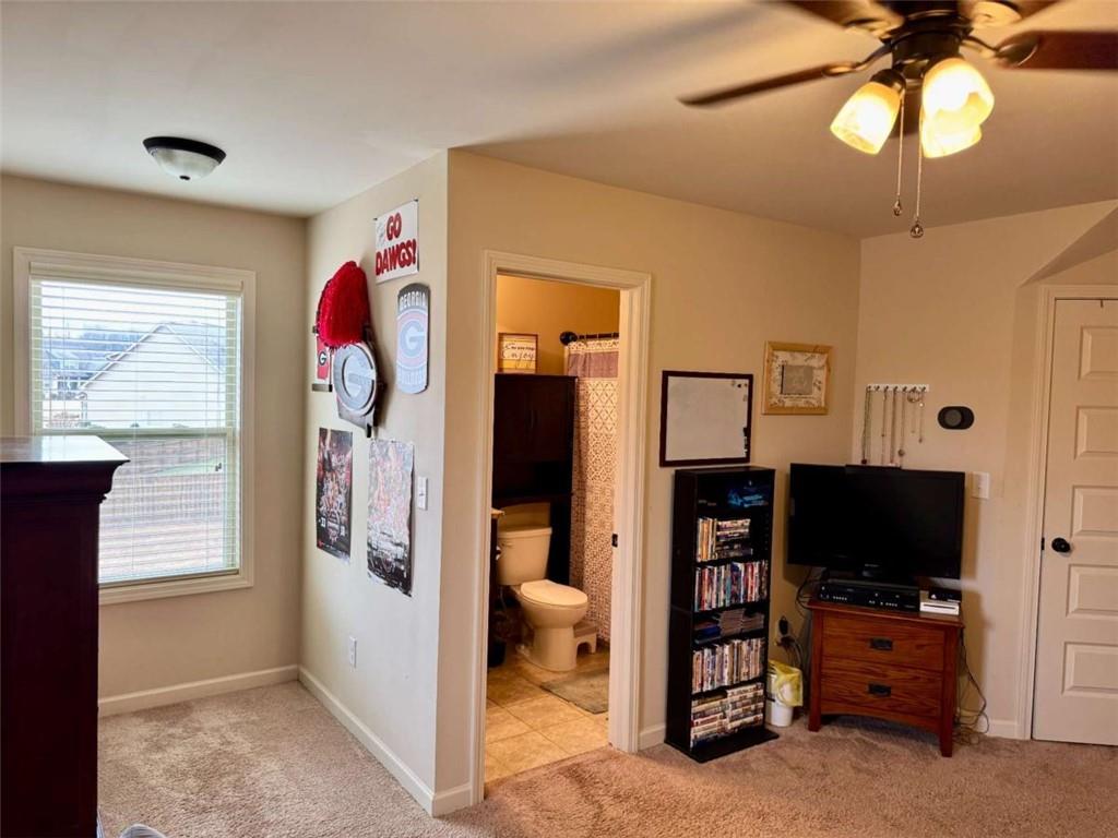 107 Feather Lane Jackson, GA 30233 - Photo 24 of 30 a view of a livingroom with furniture and a flat screen tv