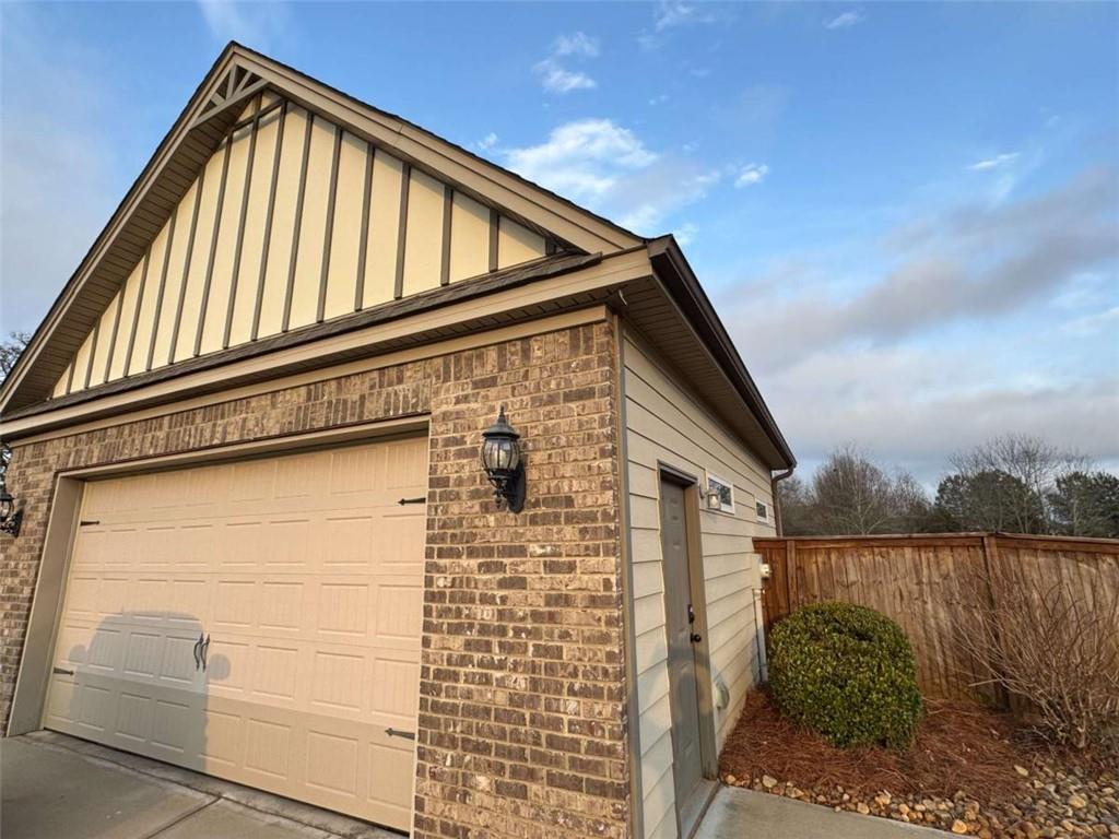 107 Feather Lane Jackson, GA 30233 - Photo 28 of 30 a front view of a house with lake view