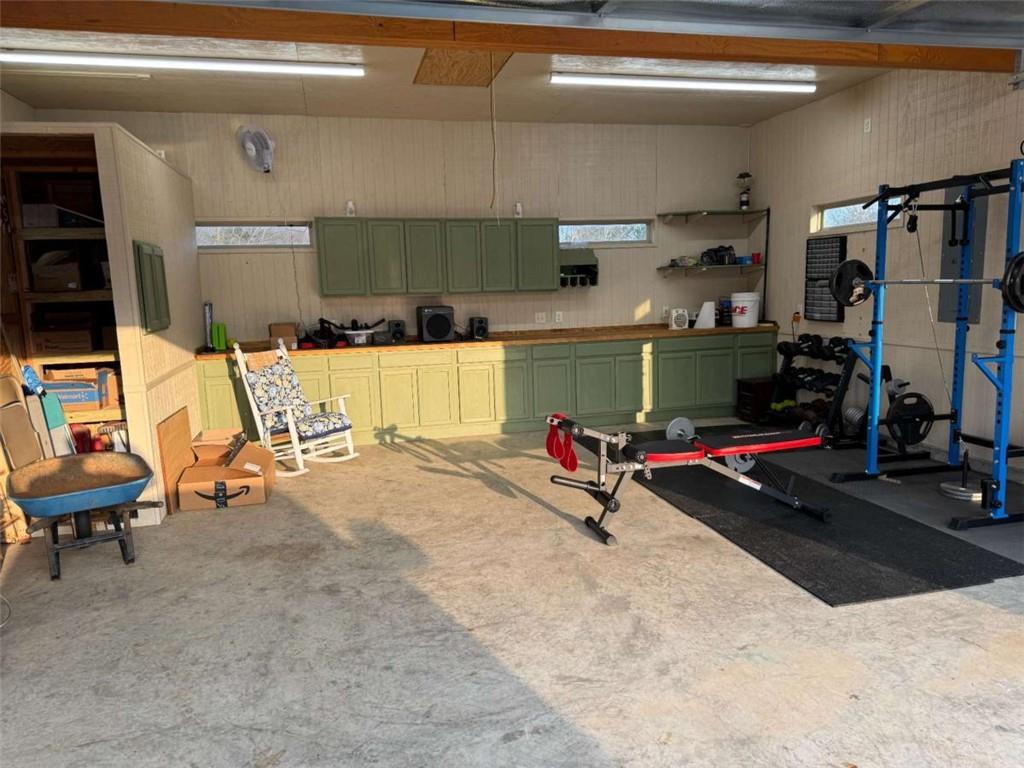 107 Feather Lane Jackson, GA 30233 - Photo 29 of 30 a view of a room with gym equipment