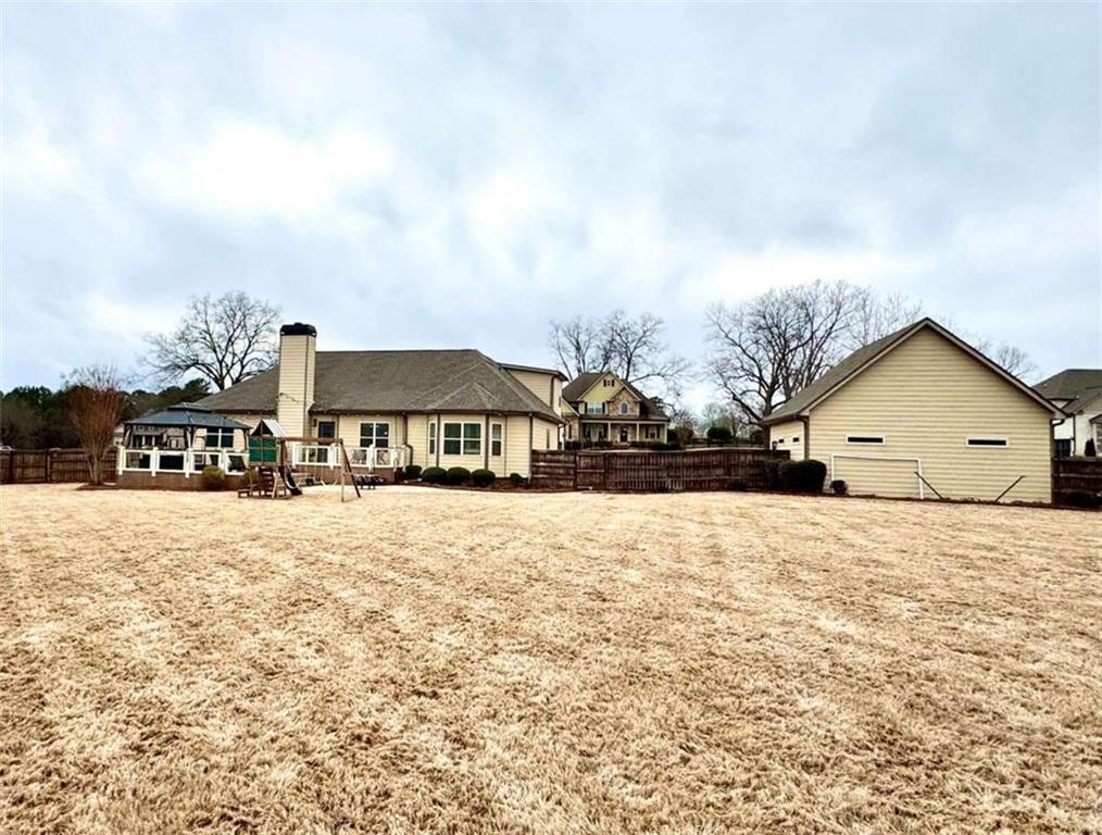107 Feather Lane Jackson, GA 30233 - Photo 3 of 30 a house with a outdoor space