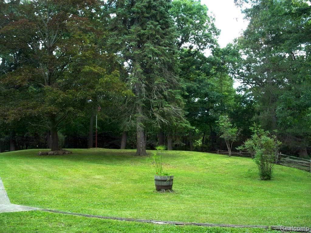 1480 Noble Road Leonard, MI 48367 - Photo 32 of 33 GREAT SUNNY SPOT FOR THAT GARDEN YOU HAVE ALWAYS WANTED