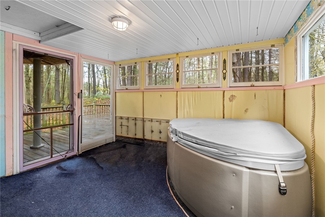 535 Log Road Smithfield, RI 02917 - Photo 40 of 48 Located off of the living room, this hot tub room is fully enclosed. Hot tub has not been used in a few years.