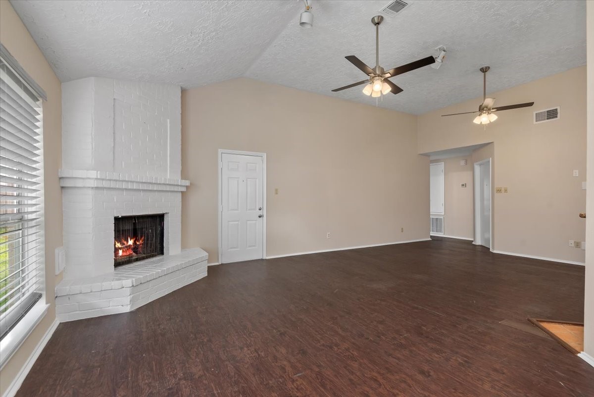6022 Sean Court Humble, TX 77346 - Photo 4 of 18 a living room with furniture and a fireplace