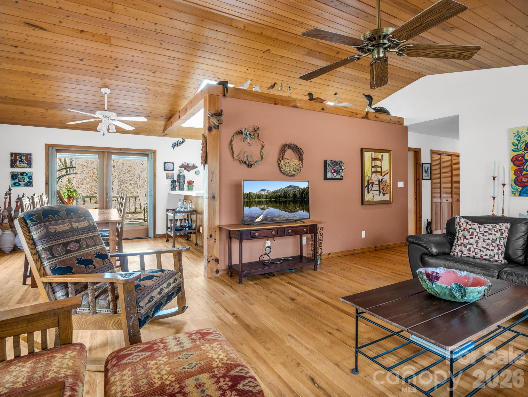 780 Rixhaven Drive Saluda, NC 28773 - Photo 12 of 36 a living room with furniture and wooden floor