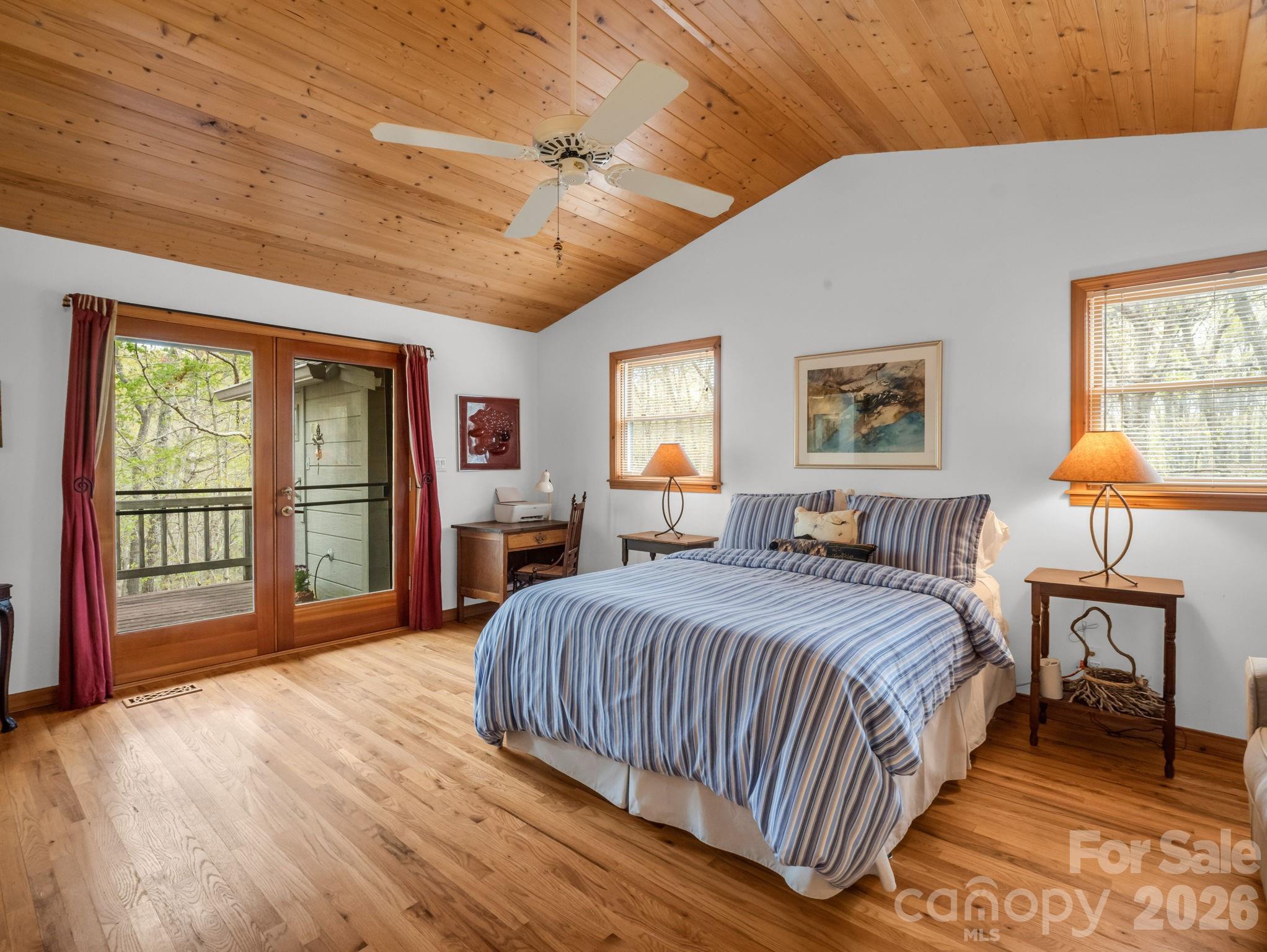 780 Rixhaven Drive Saluda, NC 28773 - Photo 19 of 36 a bedroom with a large bed and a window