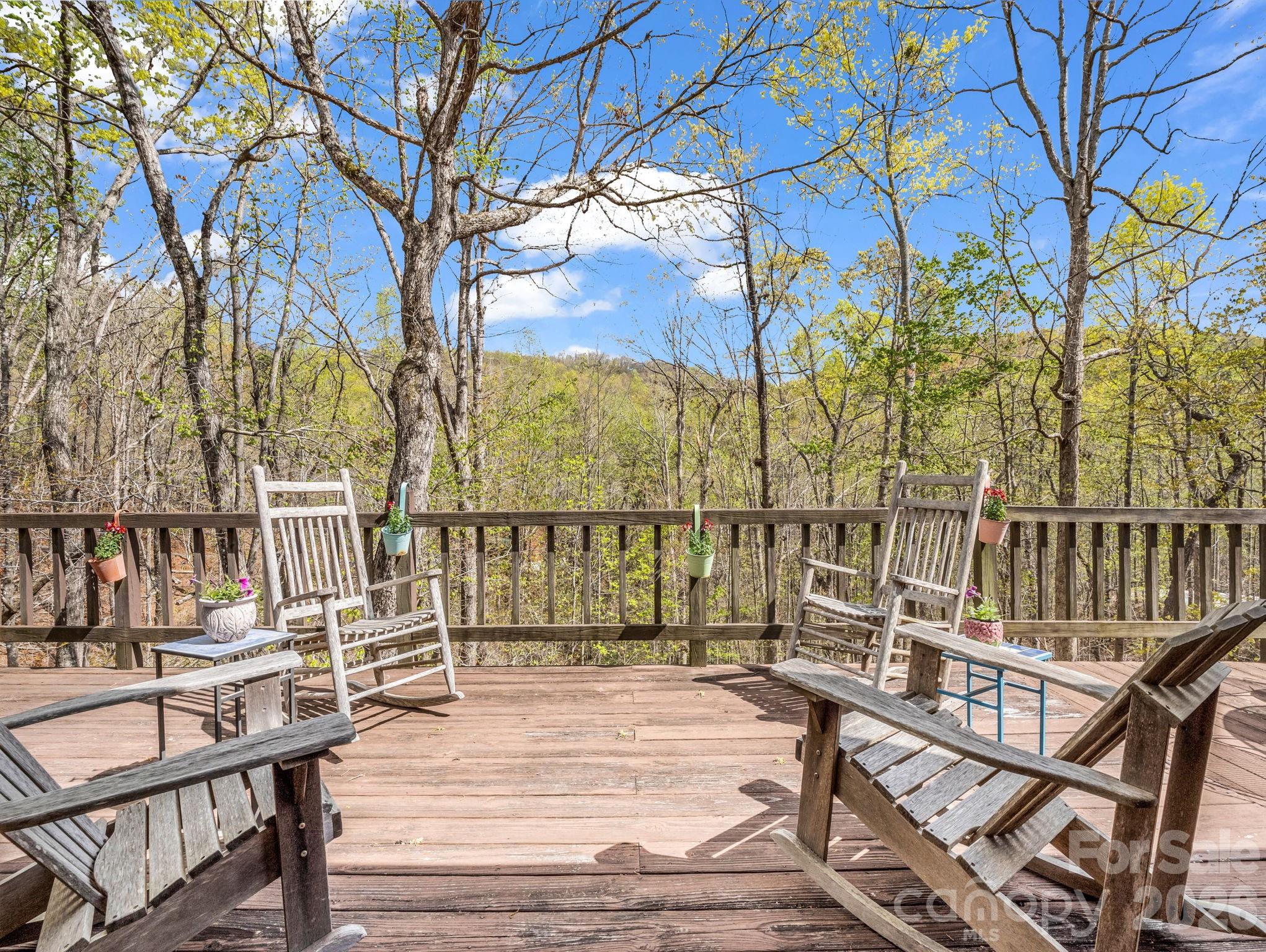 780 Rixhaven Drive Saluda, NC 28773 - Photo 27 of 36 a view of a chairs on the deck