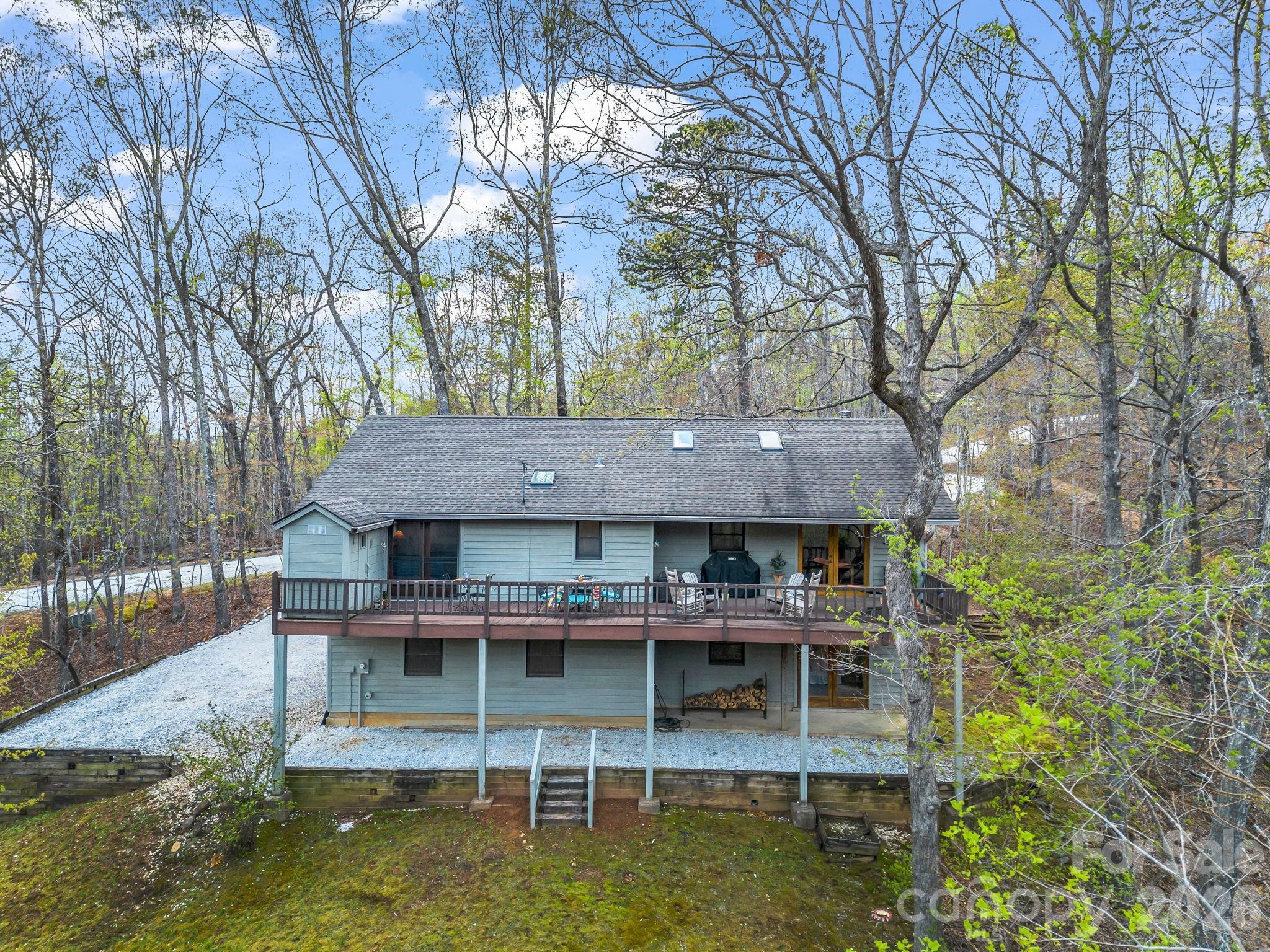 780 Rixhaven Drive Saluda, NC 28773 - Photo 6 of 36 a small pool with table and chairs