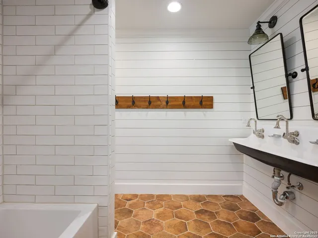 a view of room with window and wooden floor