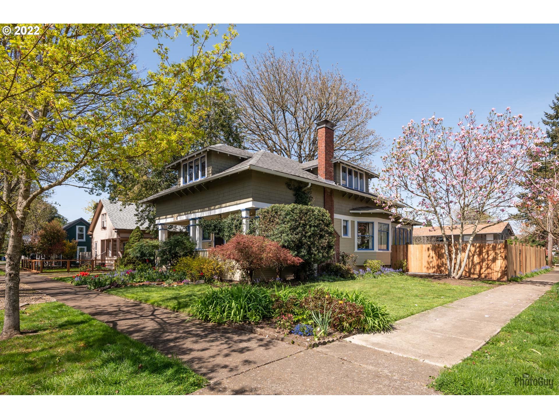 346 D Street Springfield, OR 97477 - Photo 1 of 32 a front view of a house with garden