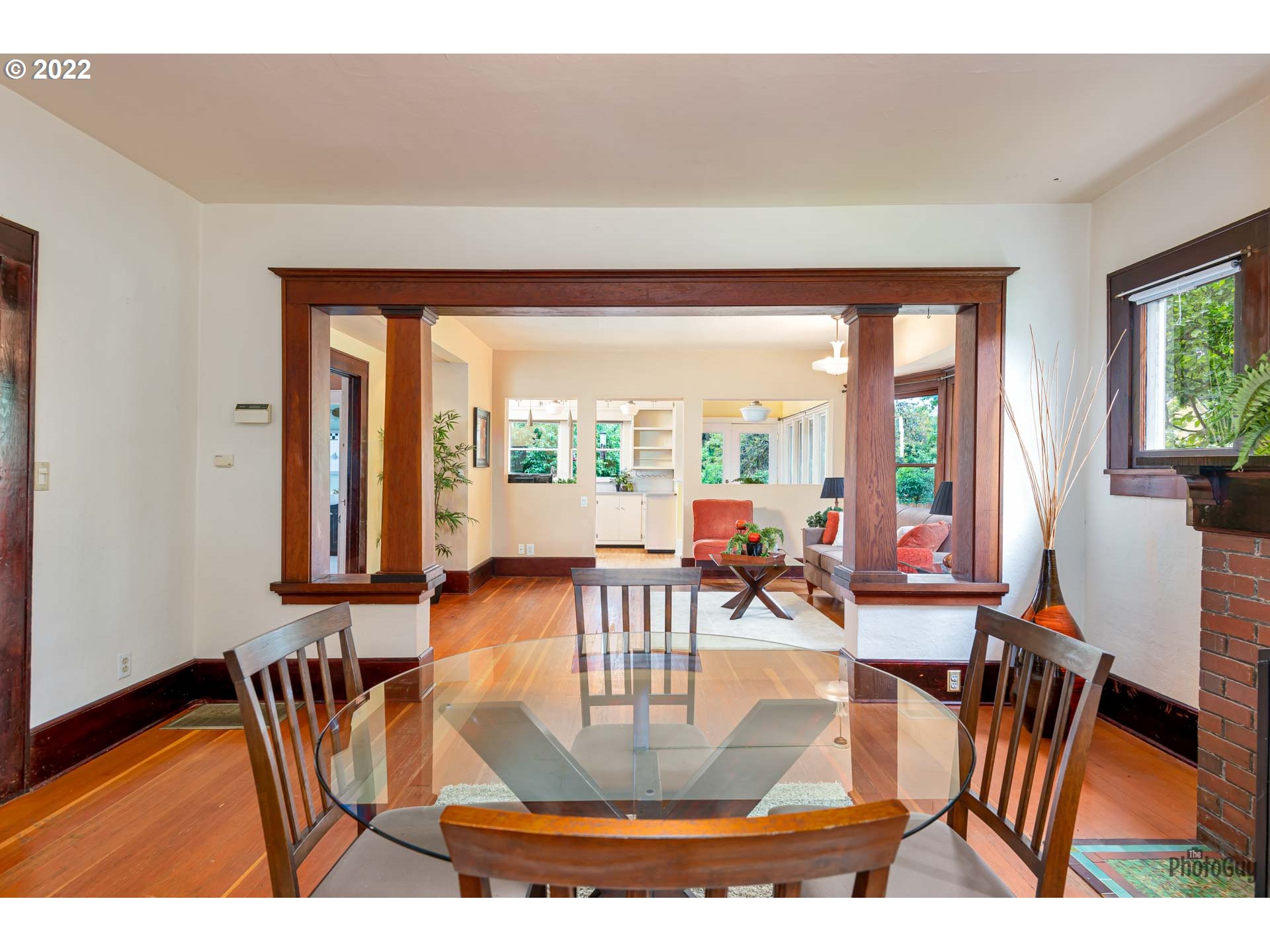 346 D Street Springfield, OR 97477 - Photo 11 of 32 a view of a dining room with furniture a chandelier and wooden floor