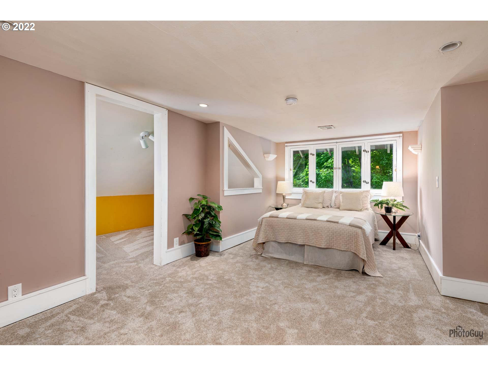 346 D Street Springfield, OR 97477 - Photo 20 of 32 a bed room with a bed and a couch
