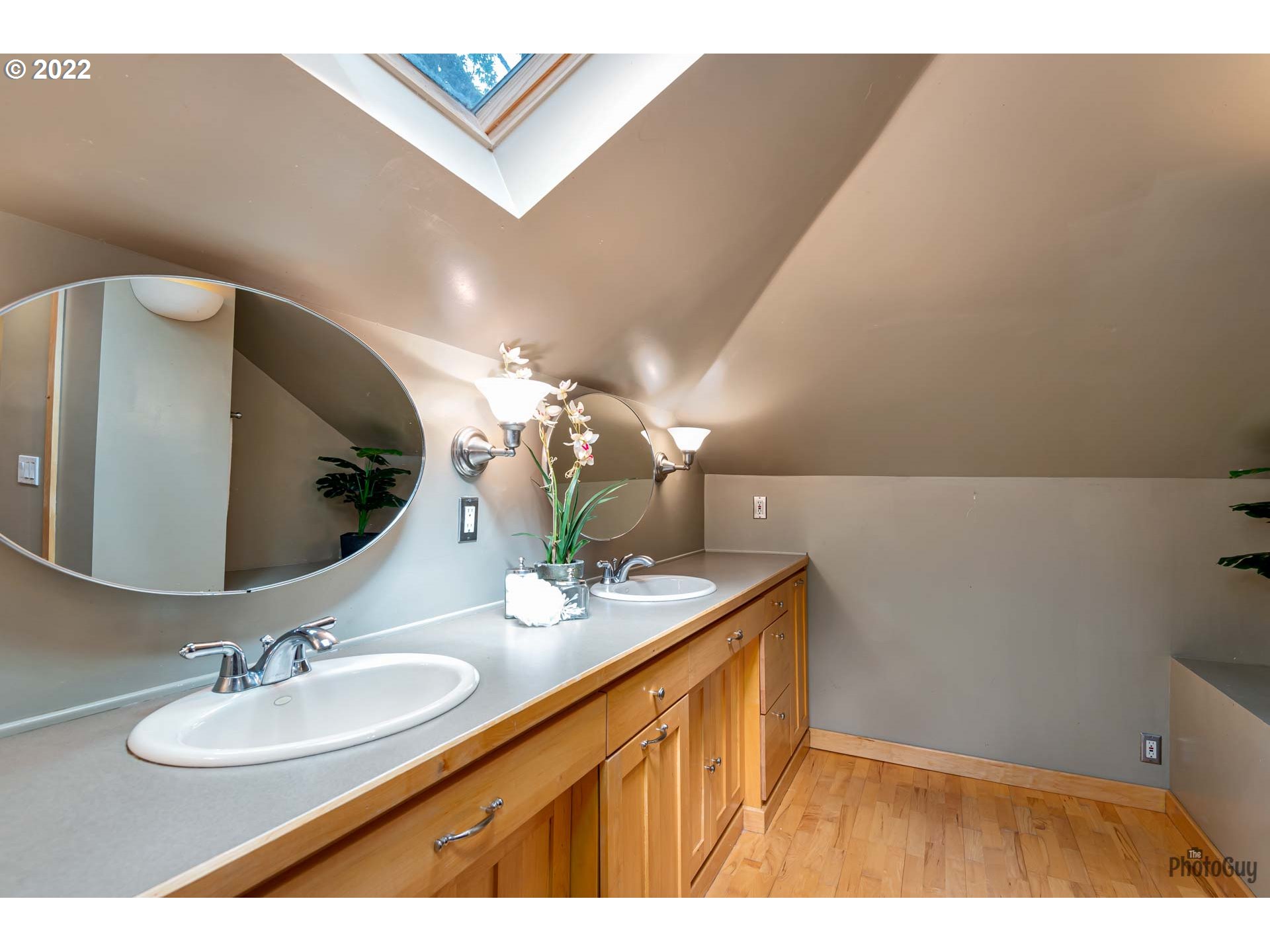 346 D Street Springfield, OR 97477 - Photo 23 of 32 a bathroom with a sink and a mirror