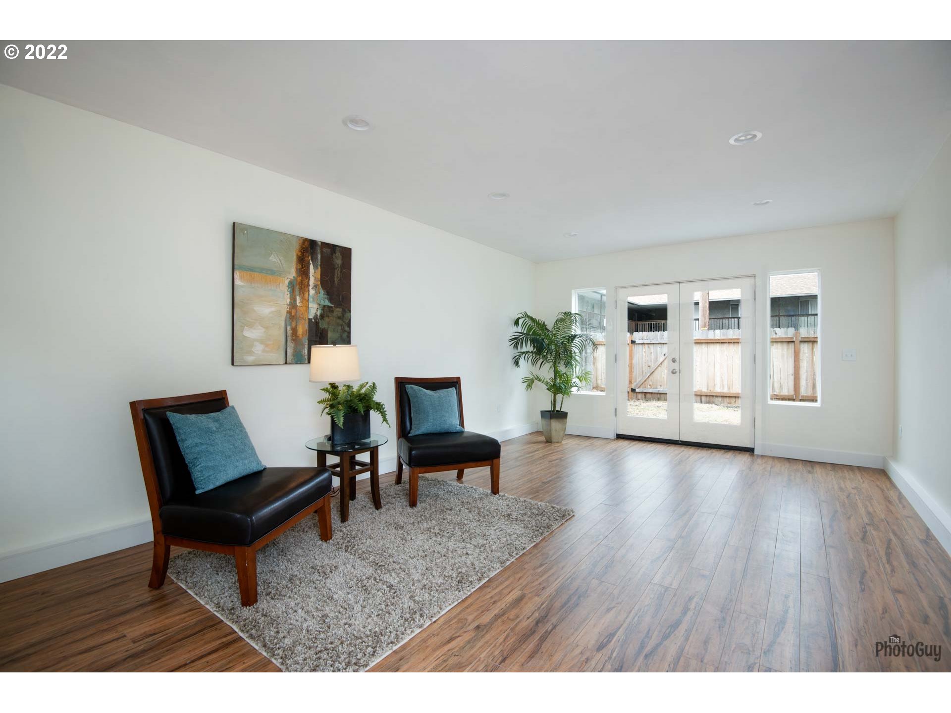 346 D Street Springfield, OR 97477 - Photo 27 of 32 a living room with furniture and wooden floor