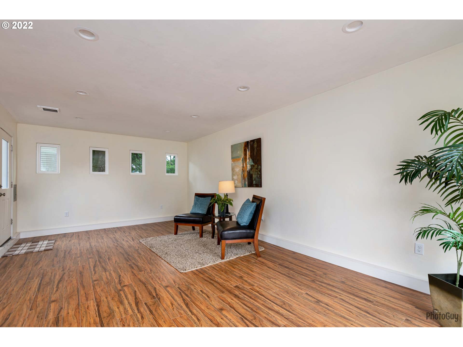 346 D Street Springfield, OR 97477 - Photo 28 of 32 a workspace with furniture and wooden floor