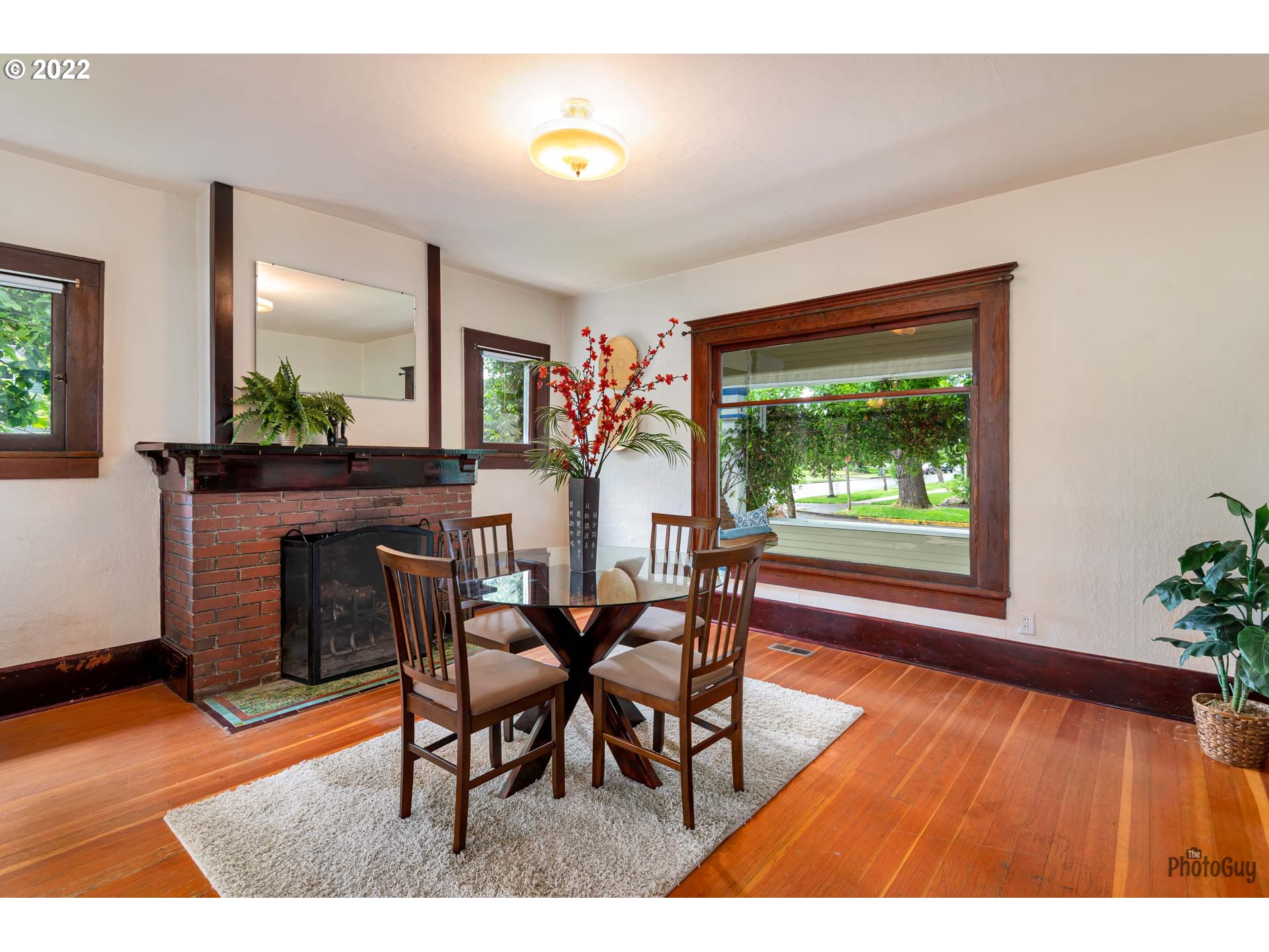 346 D Street Springfield, OR 97477 - Photo 8 of 32 a dining room with furniture and wooden floor