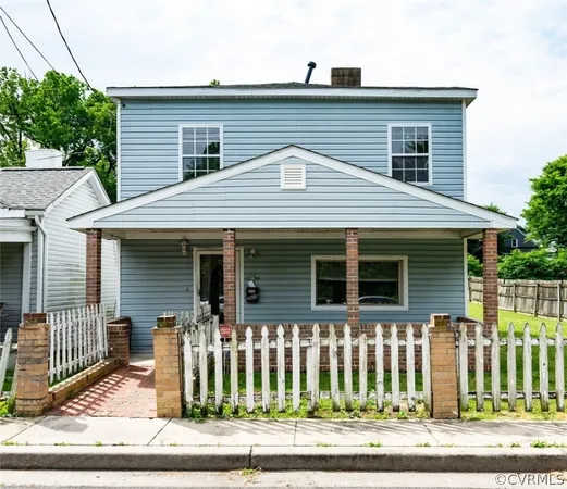 a front view of a house with a porch