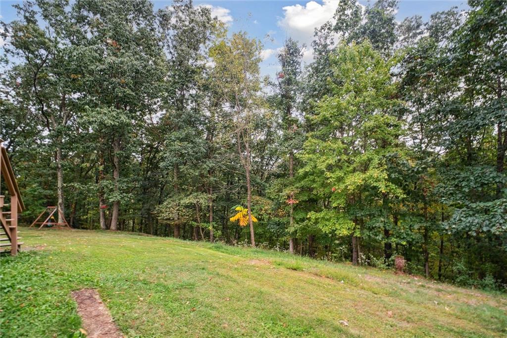 167 Wilkinson Road Templeton, PA 16259 - Photo 44 of 49 a view of outdoor space with deck and trees