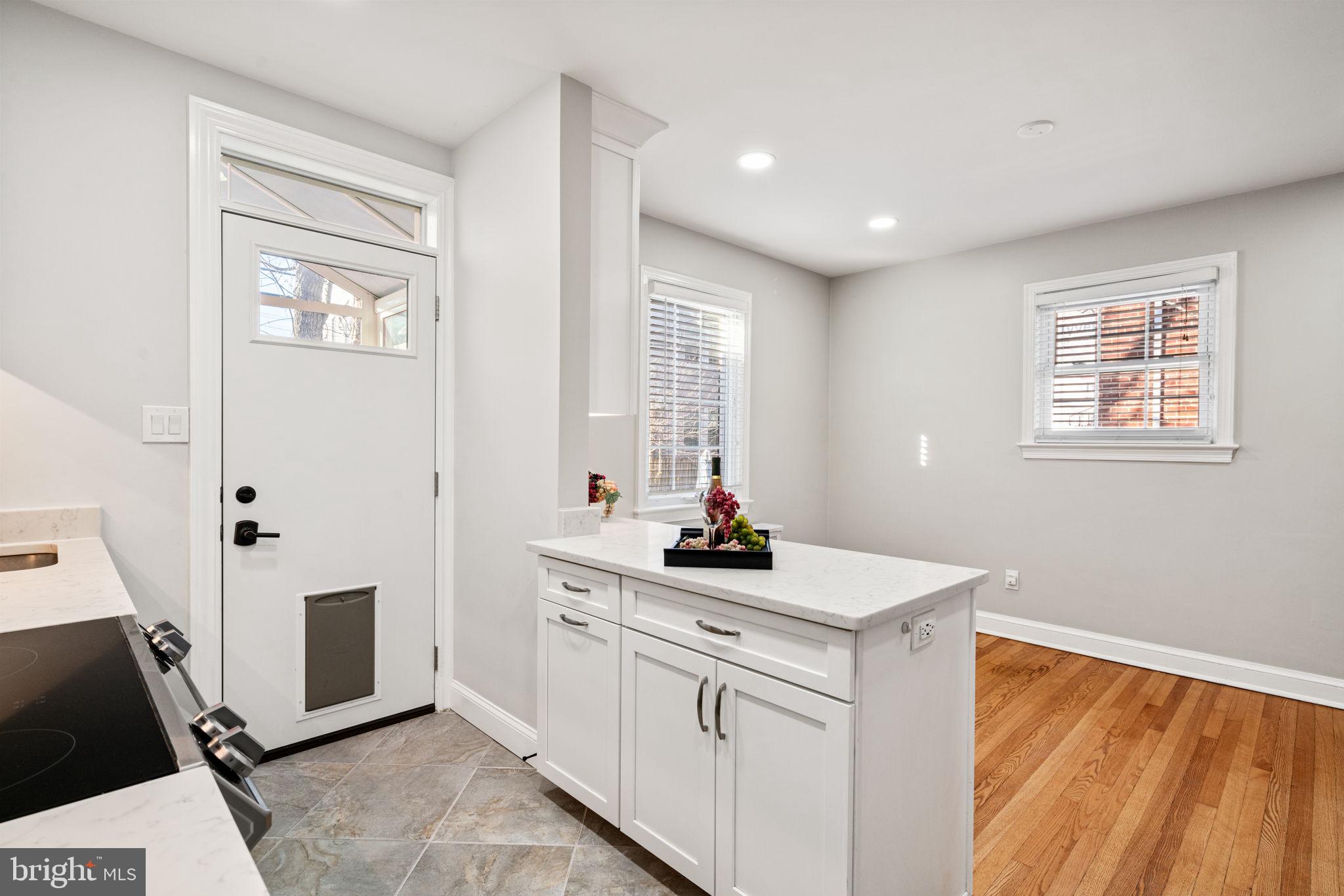 204 South Courthouse Road Arlington, VA 22204 - Photo 19 of 49 a view of a sink and dishwasher with wooden floor