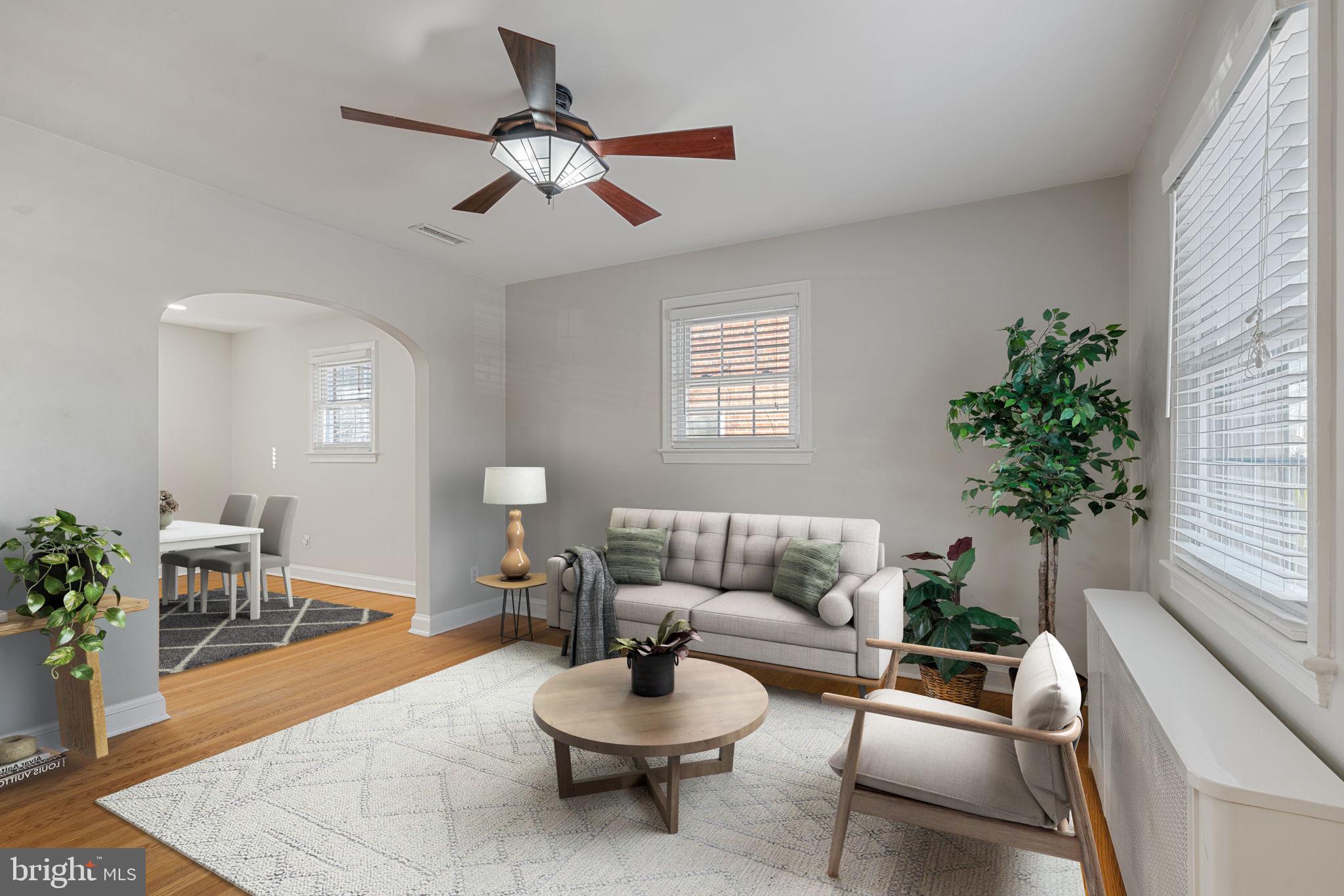 204 South Courthouse Road Arlington, VA 22204 - Photo 2 of 49 a living room with furniture and a potted plant