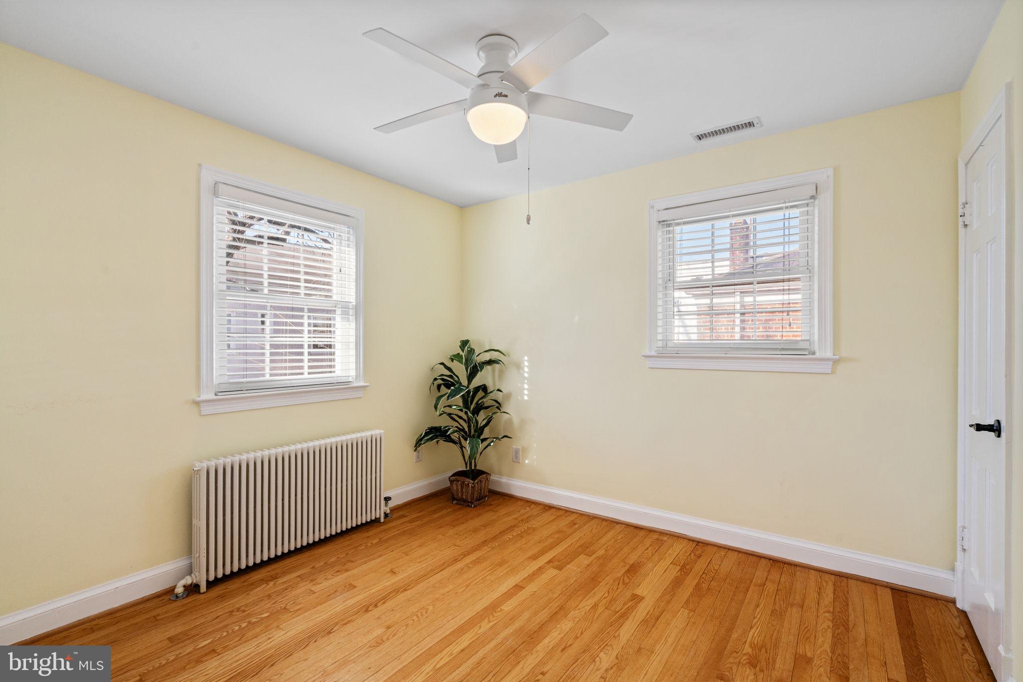 204 South Courthouse Road Arlington, VA 22204 - Photo 23 of 49 a view of an empty room with wooden floor and a window