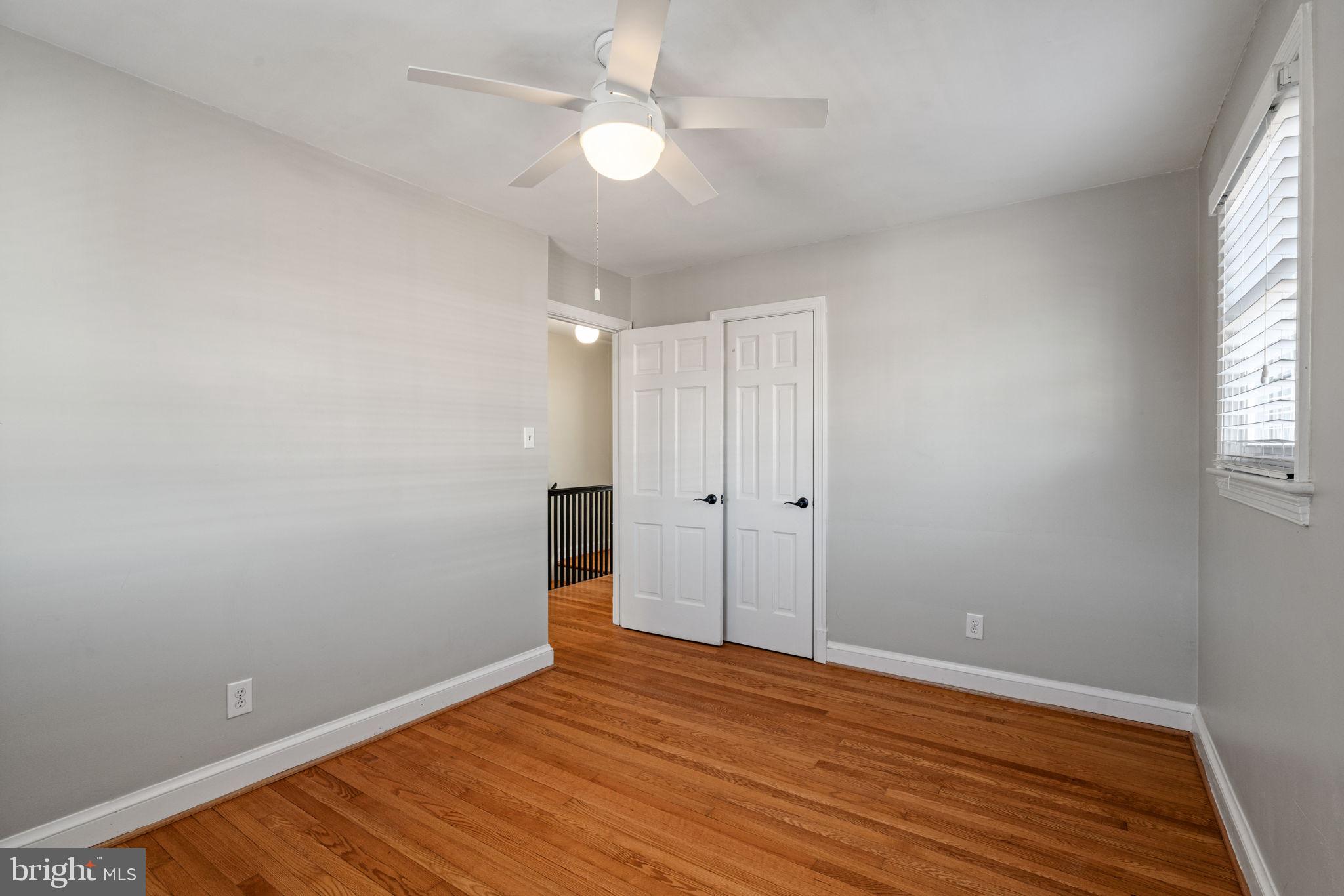 204 South Courthouse Road Arlington, VA 22204 - Photo 28 of 49 wooden floor in an empty room with a window
