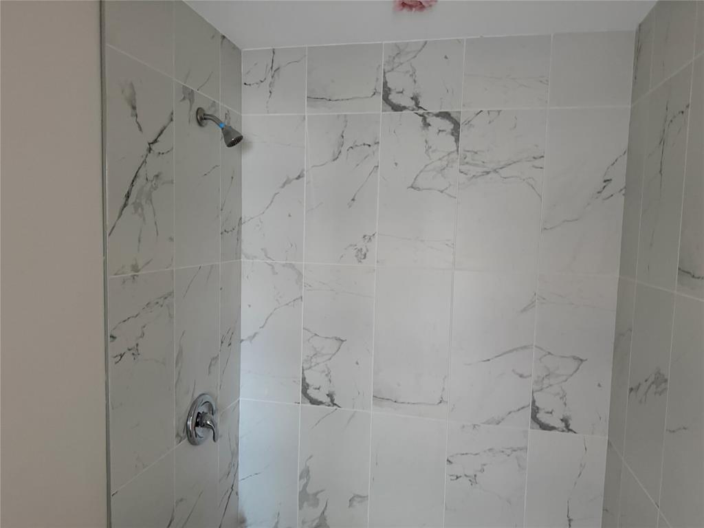 664 Haverhill Road West Palm Beach, FL 33415 - Photo 5 of 8 a bathroom with a shower