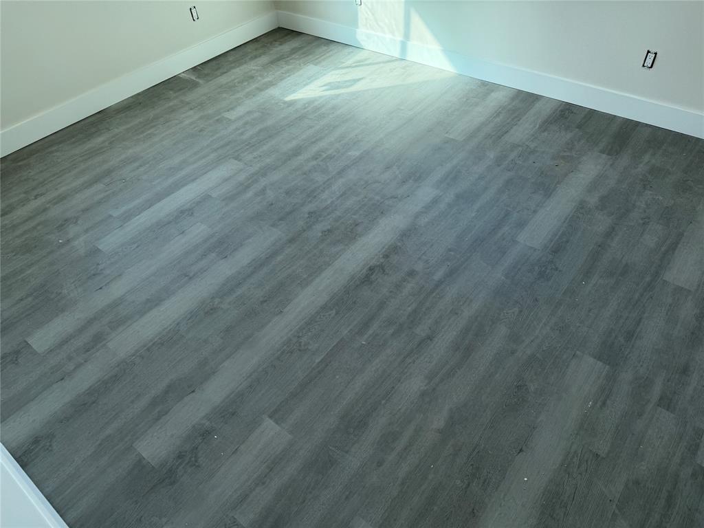 664 Haverhill Road West Palm Beach, FL 33415 - Photo 6 of 8 a view of a room with wooden floor