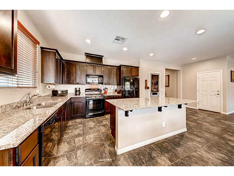 11028 Hunting Hawk Road Las Vegas, NV 89179 - Photo 15 of 30 Kitchen.
