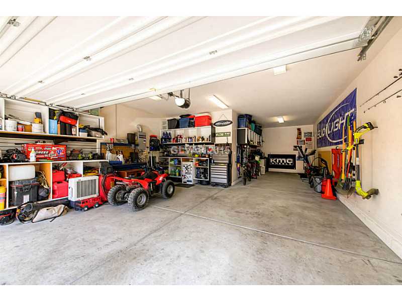 11028 Hunting Hawk Road Las Vegas, NV 89179 - Photo 29 of 30 Garage. Three Car Tandem Garage