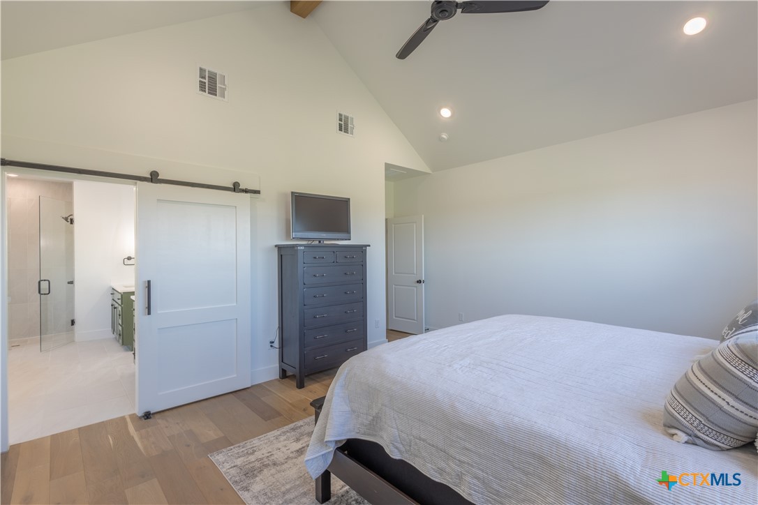 4324 Cedar Creek Road Temple, TX 76504 - Photo 16 of 45 a bedroom with a bed and a sink