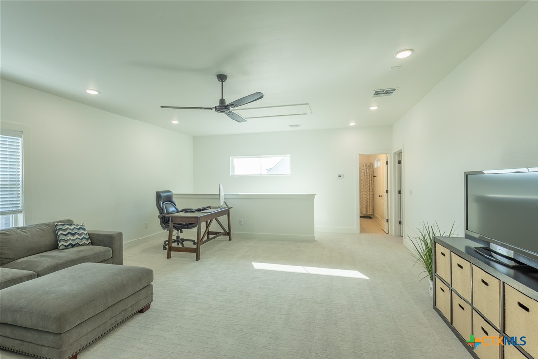 4324 Cedar Creek Road Temple, TX 76504 - Photo 45 of 45 a living room with furniture and a flat screen tv