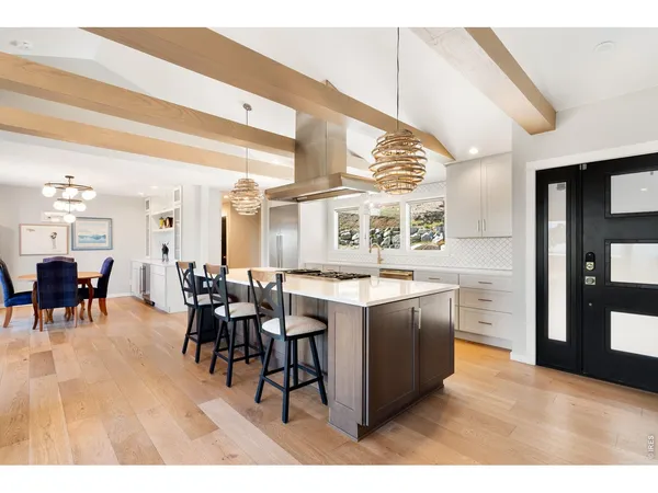 a kitchen with a sink and a window