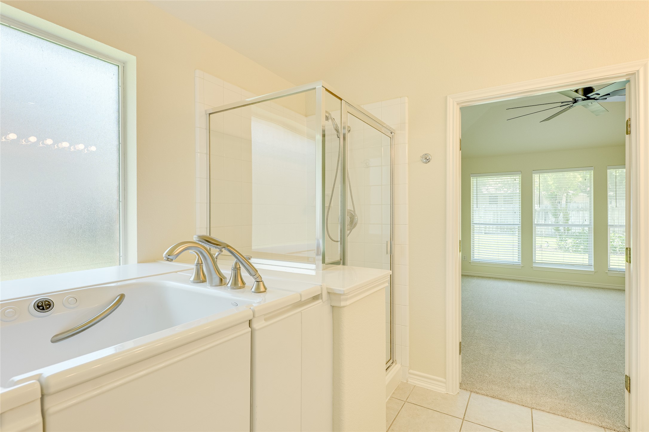 111 Arrowhead Lane Georgetown, TX 78628 - Photo 28 of 40 a bathroom with a sink and a mirror