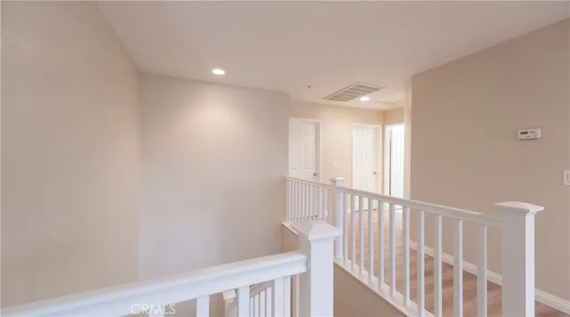 a view of hallway with stairs
