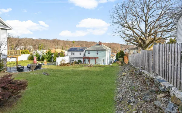 a view of a garden with houses