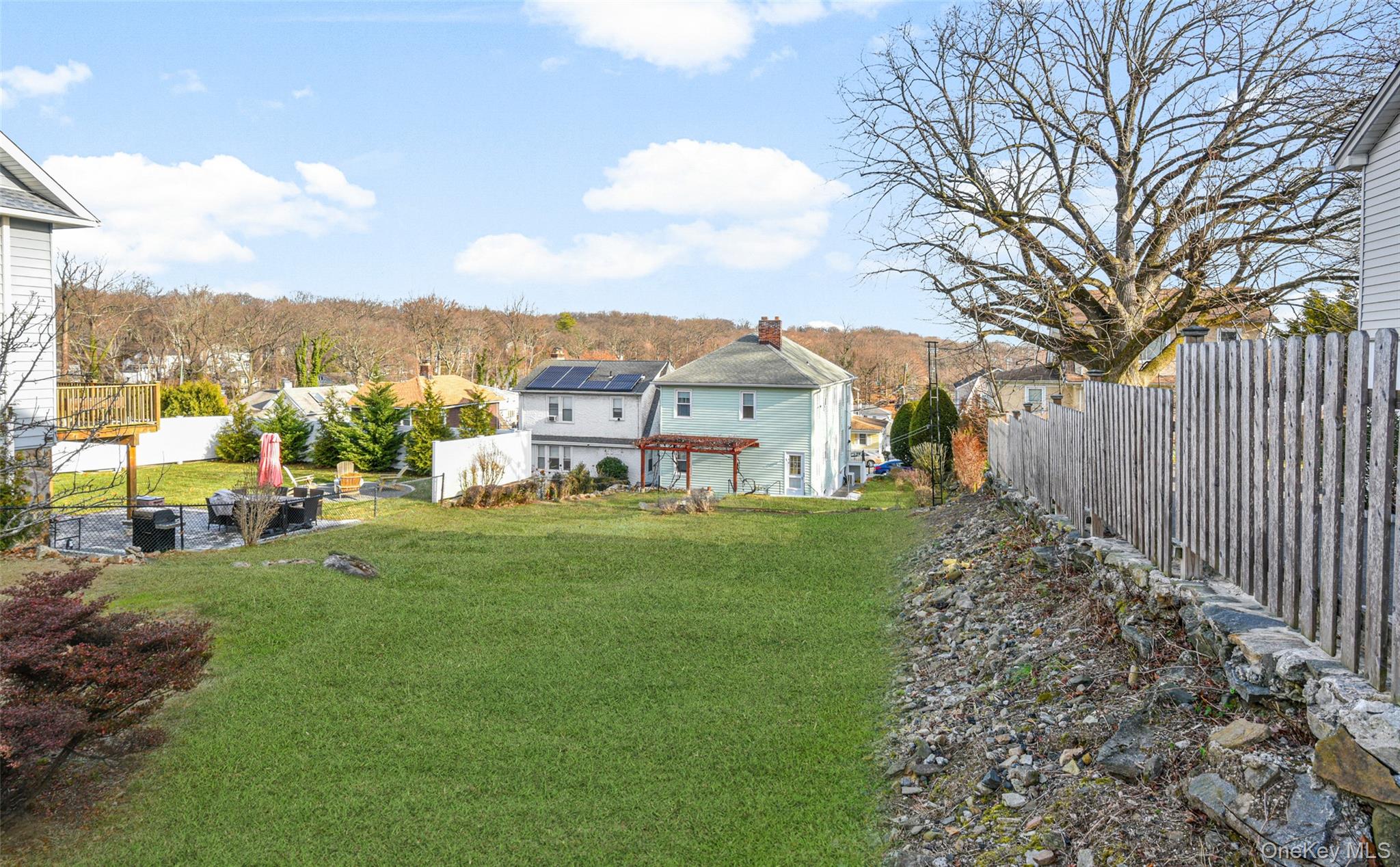 Pinebrook Road New Rochelle, NY 10801 - Photo 2 of 6 a view of a garden with houses