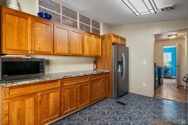 a view of kitchen with washer and dryer