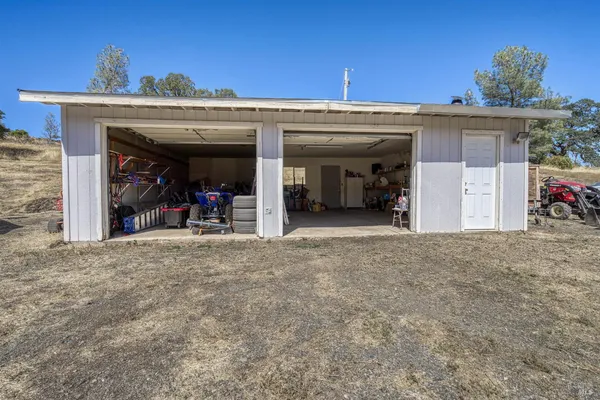 a house view with a backyard space