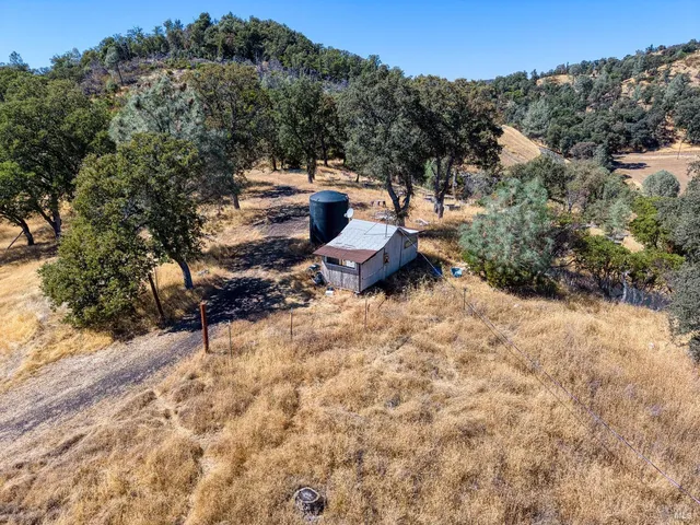 a backyard of a house with a yard
