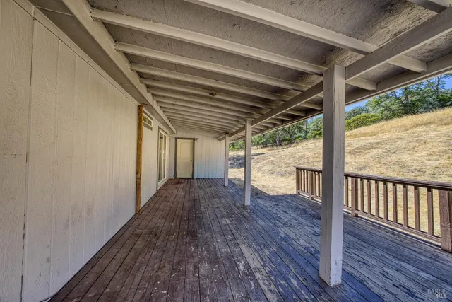 a view of a backyard of the house