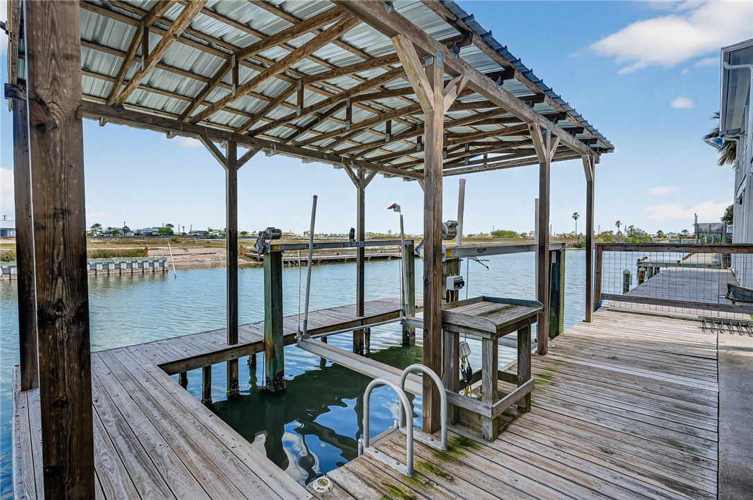 838 Rattlesnake Point Road Rockport, TX 78382 - Photo 33 of 40 a view of a roof deck with couches and ocean view