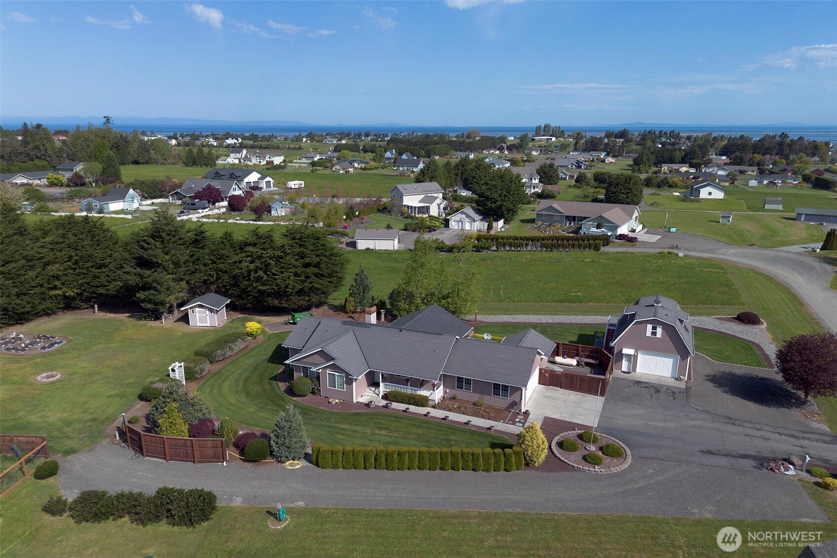 23 Pearl Place Sequim, WA 98382 - Photo 1 of 40 an aerial view of a house with outdoor space lake view and mountain view