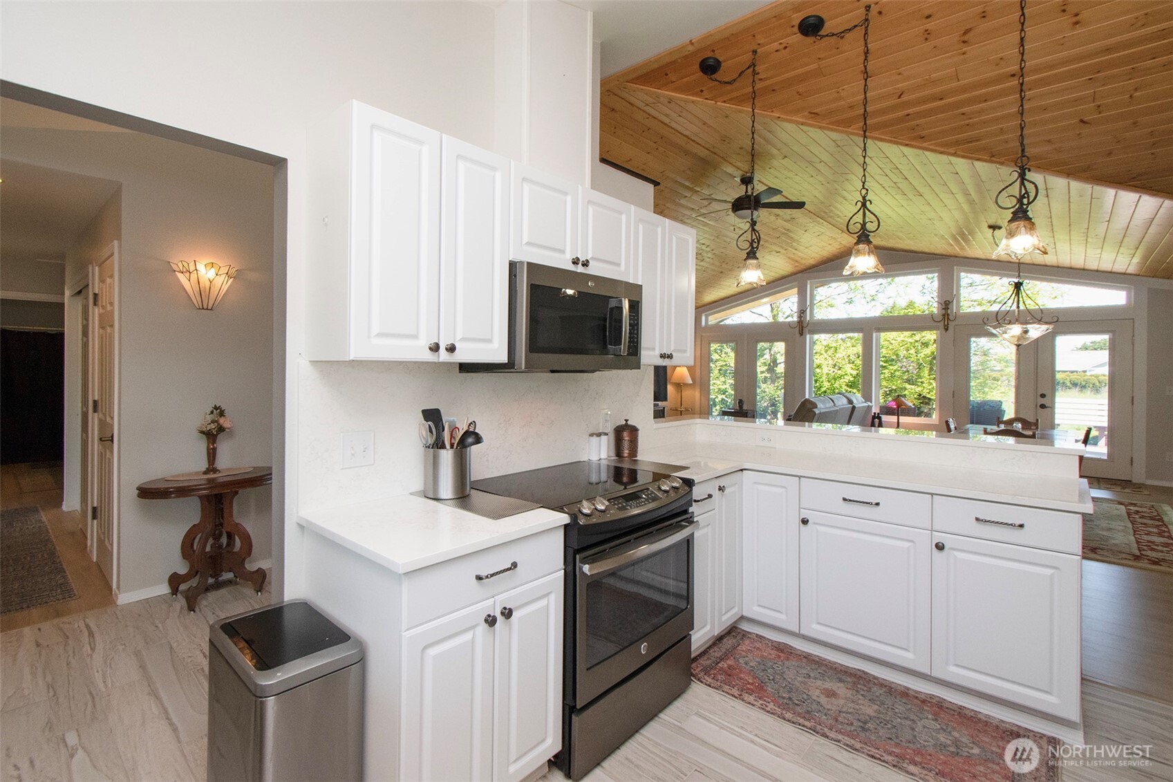 23 Pearl Place Sequim, WA 98382 - Photo 14 of 40 a kitchen with a sink cabinets and window