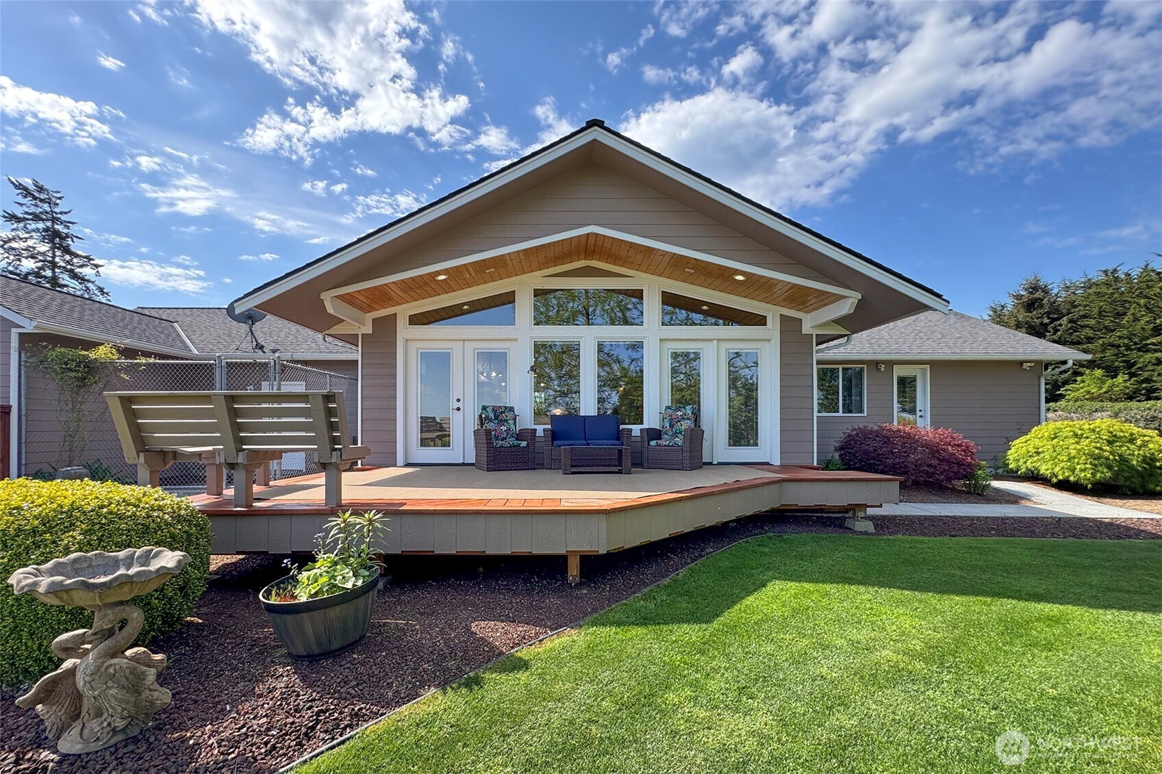 23 Pearl Place Sequim, WA 98382 - Photo 26 of 40 a view of a house with a yard porch and sitting area