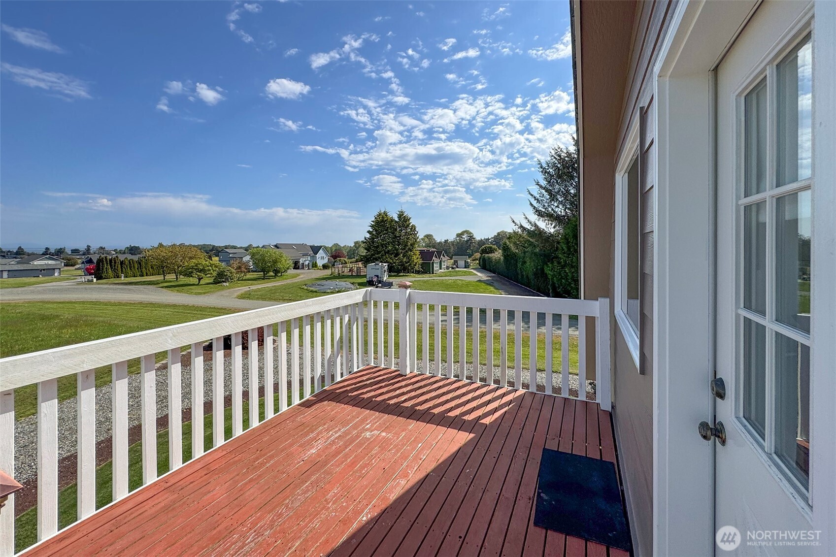 23 Pearl Place Sequim, WA 98382 - Photo 32 of 40 a view of balcony with wooden floor and fence