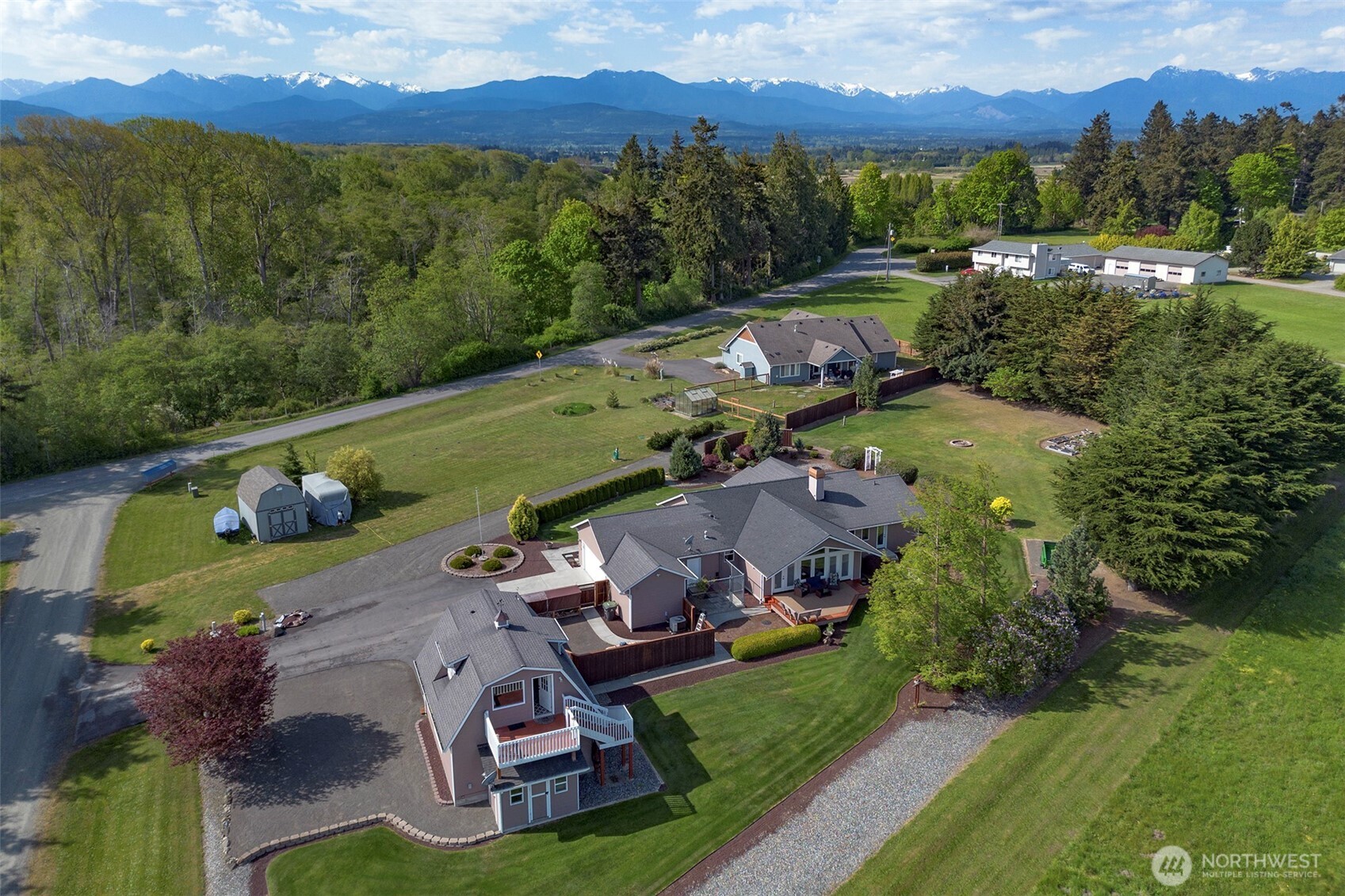 23 Pearl Place Sequim, WA 98382 - Photo 40 of 40 an aerial view of a house with a garden