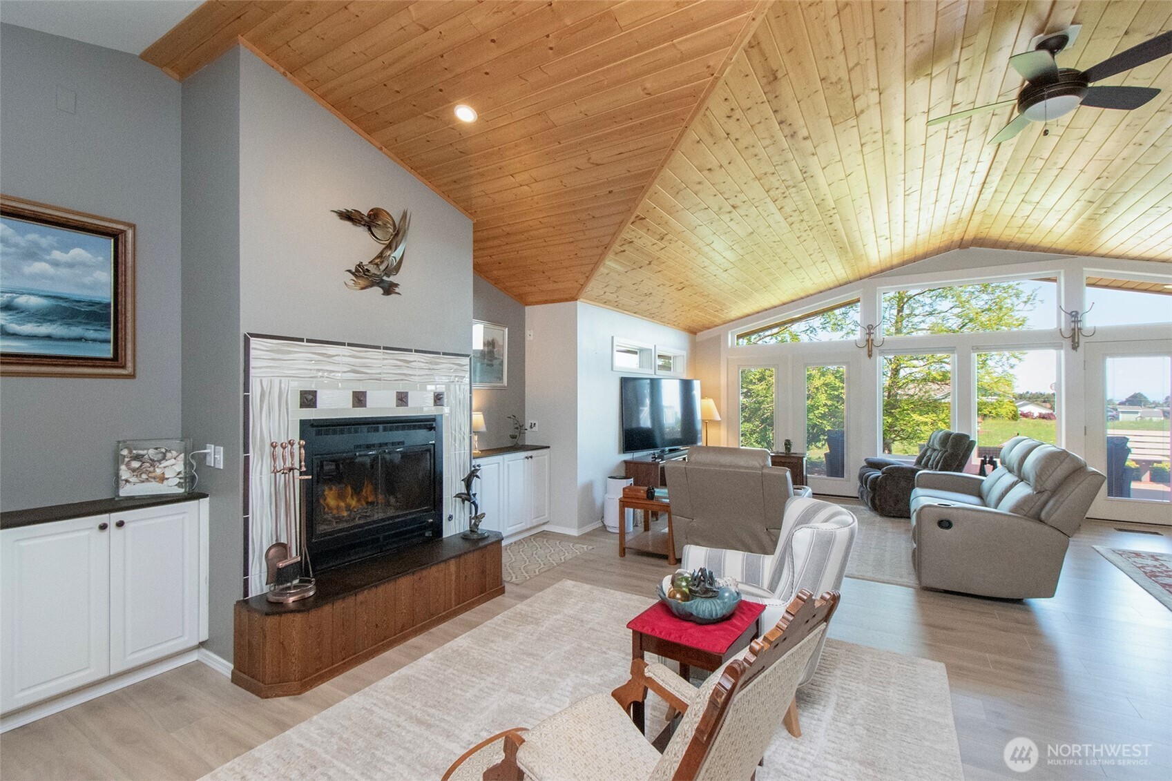 23 Pearl Place Sequim, WA 98382 - Photo 5 of 40 a living room with furniture and a fireplace