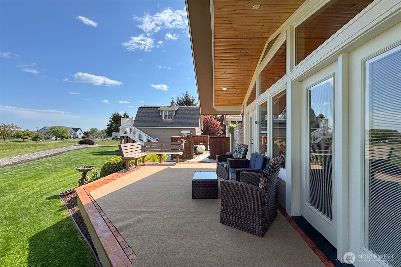 23 Pearl Place Sequim, WA 98382 - Photo 9 of 40 a view of a patio with couches and potted plants