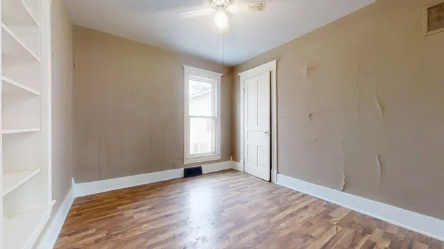 a view of a kitchen with a sink and dishwasher cabinets